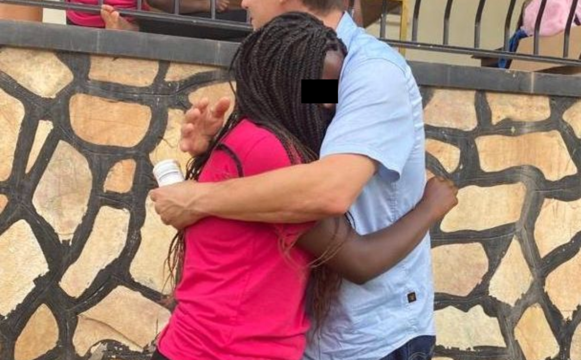 Photo of Scott hugging the youth he talks about in this post.