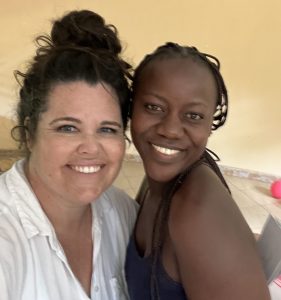 Two women smiling.